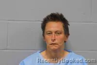 Mugshot of Tiffany Ann Hudgins booked in Johnson County, Missouri on October 21, 2026