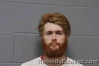 Mugshot of Jackson Theodore Suggs booked in Johnson County, Missouri on October 26, 2026