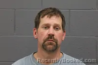 Mugshot of MARSHALL RHEA