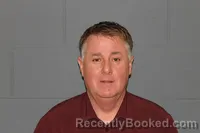 Mugshot of TRAVIS FISHER