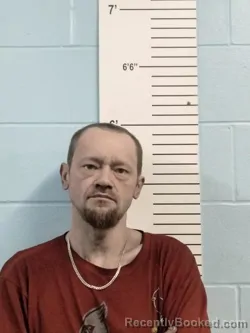 Mugshot of BRYAN E BREWER