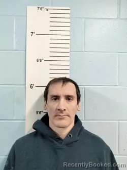 Mugshot of MATHEW UNK CHARLEVILLE