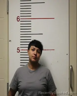 Mugshot of ELISA CARMEL MOSQUEDA