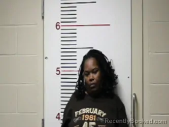 Mugshot of DINISHIA CATALINE MORROW booked in Anderson County, Texas on April 12, 2026