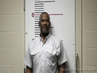 Mugshot of JONATHAN ISIAH BENTON booked in Anderson County, Texas on April 12, 2026