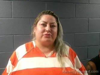 Mugshot of Ivania Lizbett Osegueda Salazar booked in McDonald County, Missouri on June 10, 2026