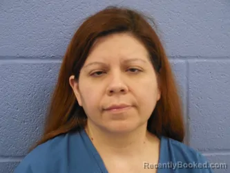 Mugshot of MARIA AUXILIADORA SPELLMAN booked in Andrews County, Texas on April 5, 2026