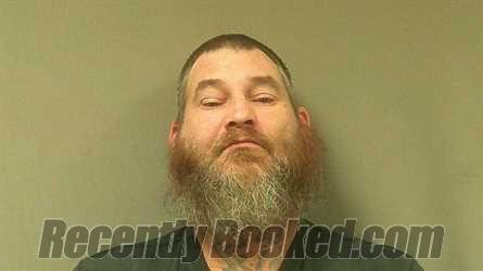 Booking photo from Monroe County, Missouri