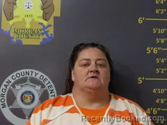 Mugshot of CHARITY BAKER booked in Morgan County, Missouri on April 21, 2026