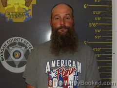 Mugshot of Dennis Lee Komrska booked in Morgan County, Missouri on October 4, 2026