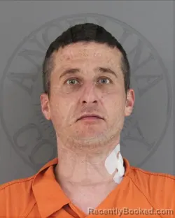 Mugshot of TRAVIS LAYNE SELF