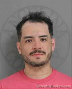 Mugshot of Jorge Adrian Granados booked in Angelina County, Texas on October 12, 2026