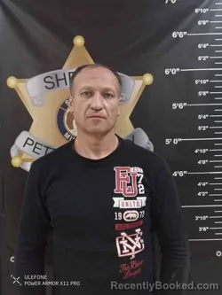 Mugshot of VITALIY VARVARYUK