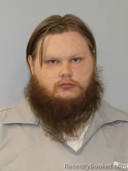 Mugshot of CAMERON DANIEL DAUGHENBAUGH