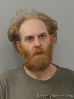 Mugshot of CODY TRAVIS HELTON