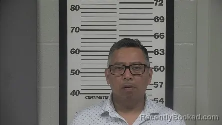 Mugshot of CESAR AUGUSTO MINA booked in Platte County, Missouri on July 13, 2026