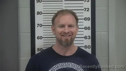 Mugshot of JOSHUA ADAM RANSDELL booked in Platte County, Missouri on August 4, 2026