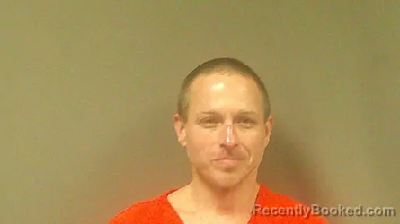 Mugshot of JON TRAVIS REDIFER