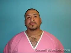 Mugshot of RAMIRO JR GUTIERREZ