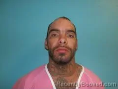 Mugshot of JUSTIN ANDREW GUNNELS booked in Aransas County, Texas on March 18, 2026