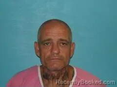 Mugshot of HENRY ORVALL MOORE booked in Aransas County, Texas on April 14, 2026