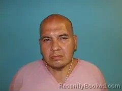 Mugshot of JOHN RAYMOND HUIZAR booked in Aransas County, Texas on April 23, 2026