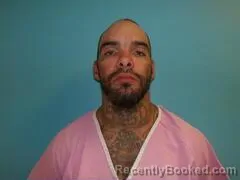 Mugshot of JUSTIN ANDREW GUNNELS booked in Aransas County, Texas on April 30, 2026