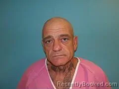 Mugshot of HENRY ORVALL MOORE booked in Aransas County, Texas on May 26, 2026
