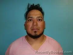 Mugshot of JUAN AVALOS-CRUZ booked in Aransas County, Texas on July 2, 2026