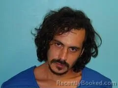 Mugshot of AUGUSTINE ANGEL HERNANDEZ booked in Aransas County, Texas on July 26, 2026