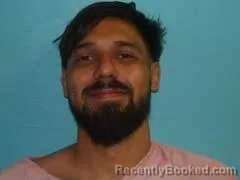 Mugshot of Jacob Chandler Guzman booked in Aransas County, Texas on August 27, 2026