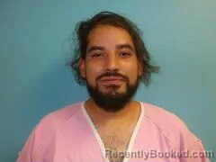 Mugshot of Reyven Pena booked in Aransas County, Texas on August 27, 2026