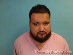 Mugshot of Eric Andrew Perez booked in Aransas County, Texas on October 4, 2026