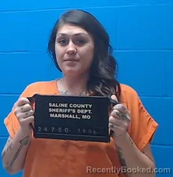 Mugshot of Ashley Renee Glover booked in Saline County, Missouri on October 9, 2026