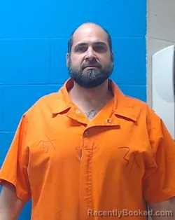 Mugshot of Carl Clayton Roettgen