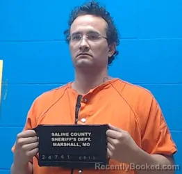 Mugshot of Claudio Gabriel Santos booked in Saline County, Missouri on June 13, 2026