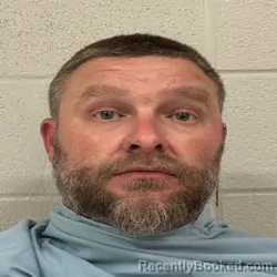 Mugshot of DUSTIN JAMES KINZER