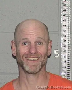 Mugshot of BARAK ROSS EVANS booked in Flathead County, Montana on July 30, 2026