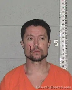 Mugshot of Christian Carl Wood-Camacho booked in Flathead County, Montana on August 16, 2026