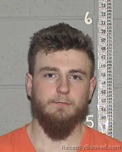 Mugshot of ASHTON JAMES CHAPMAN-DAVIS booked in Flathead County, Montana on March 20, 2026