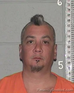 Mugshot of BRIAN SCOTT TORRES-EVANS booked in Flathead County, Montana on May 12, 2026