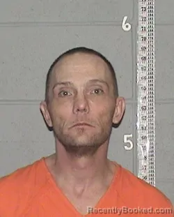 Mugshot of CLIFFORD DANIEL DELGER booked in Flathead County, Montana on March 27, 2026