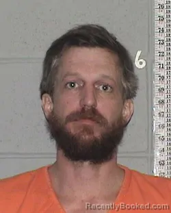 Mugshot of CHARLES WHITMIRE JOHNSON booked in Flathead County, Montana on April 3, 2026