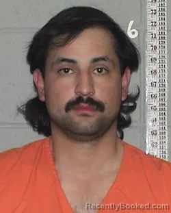 Mugshot of ISAAC REGALADO booked in Flathead County, Montana on June 15, 2026