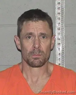 Mugshot of JOSHUA BERNARD ARMSTRONG booked in Flathead County, Montana on July 9, 2026