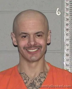 Mugshot of JONATHAN GEORGE GRAVES booked in Flathead County, Montana on March 20, 2026