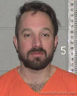 Mugshot of JOHN CHARLES HUGHES