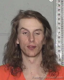 Mugshot of KENNIE RICHARD BADEKER booked in Flathead County, Montana on June 25, 2026