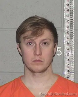 Mugshot of LOGAN JAMES TROESTER