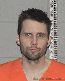 Mugshot of NICHOLAS JAMES PUGH booked in Flathead County, Montana on March 11, 2026